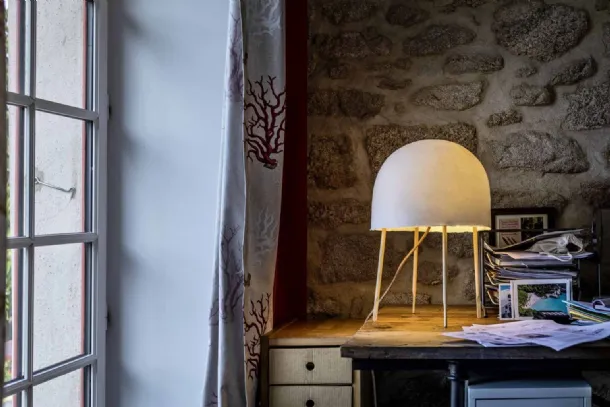 Kurage table lamp in washi paper and ash wood by Foscarini.