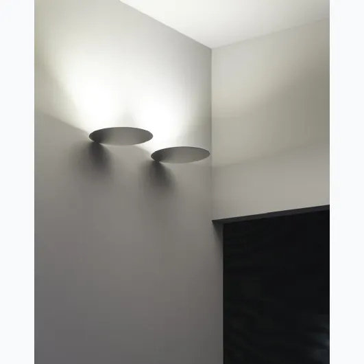 Millimeter wall lamp by Luceplan.