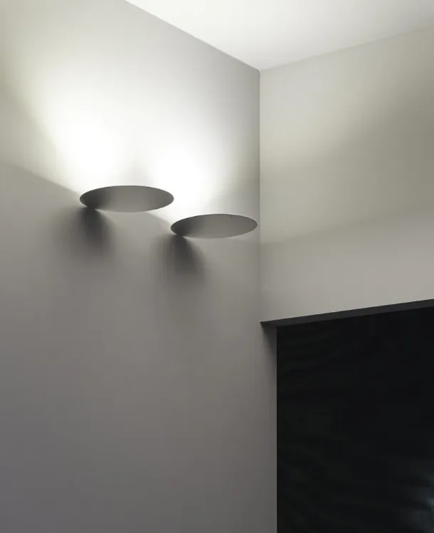 Millimeter wall lamp by Luceplan.