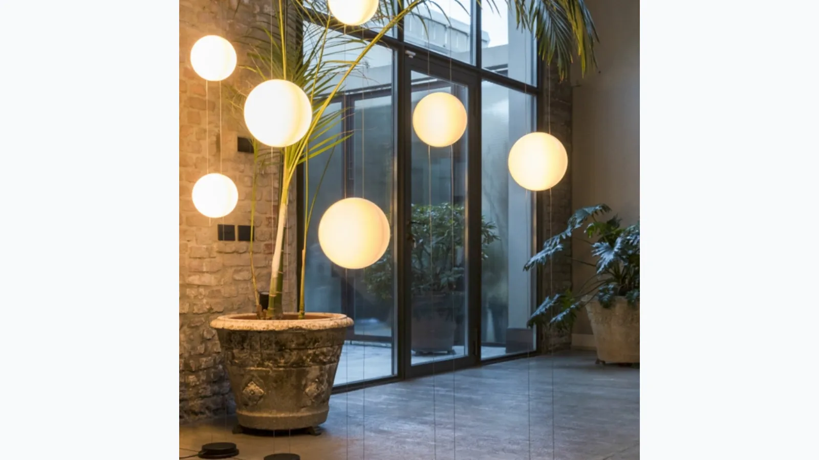 Orbit floor ceiling lamp by Mogg