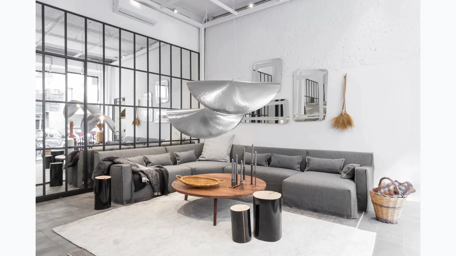 Silver suspension lamp by Gervasoni.