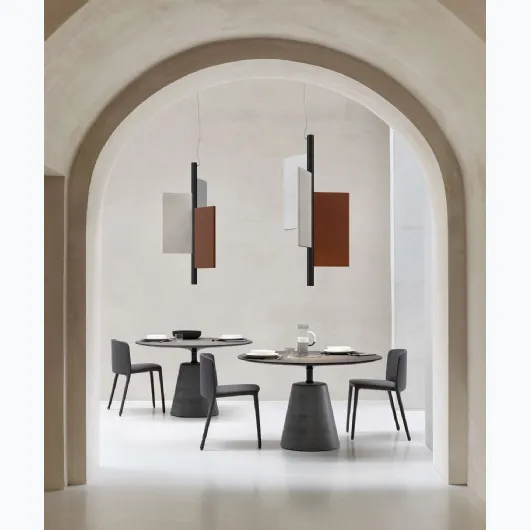 Design suspension lamp with aluminum frame coated in acoustic material and Trypta fabric by Luceplan.