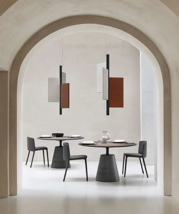 Design suspension lamp with aluminum frame coated in acoustic material and Trypta fabric by Luceplan.