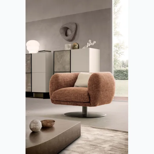 Bali armchair in padded fabric with central metal leg by Presotto.