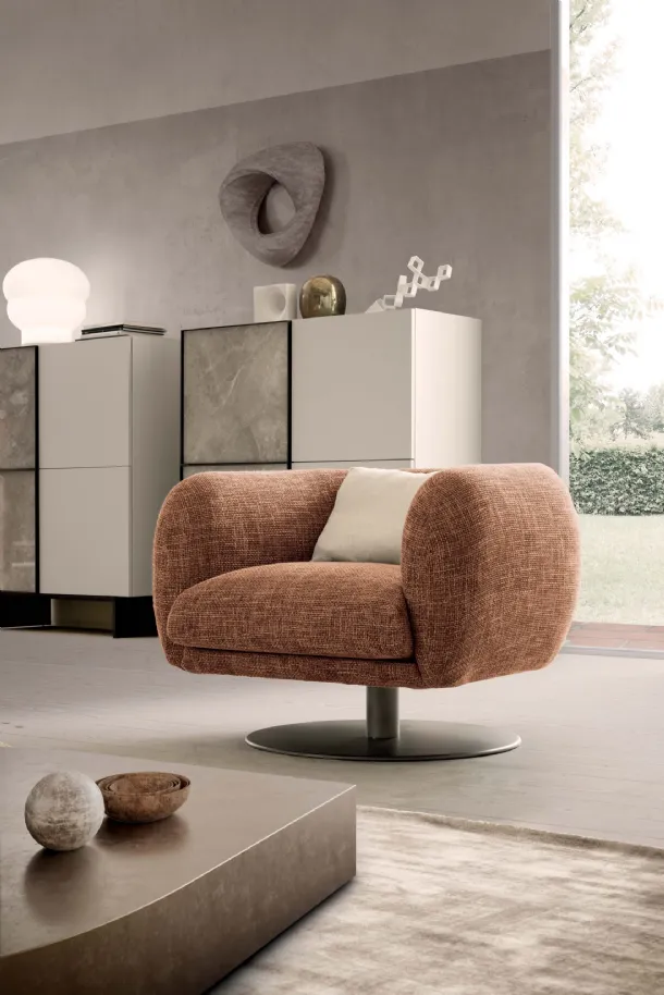 Bali armchair in padded fabric with central metal leg by Presotto.