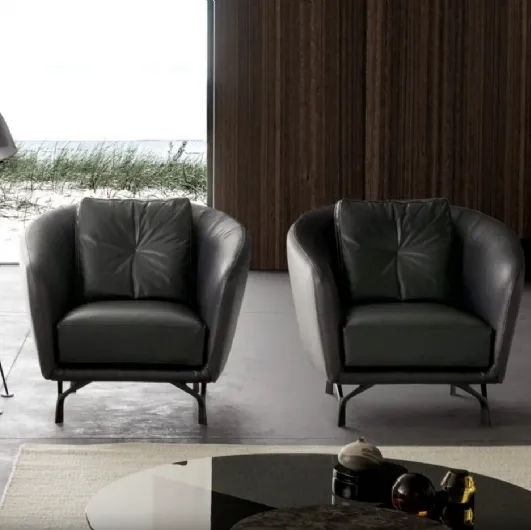 Leather armchair with enveloping backrest Ethos by Valentini.