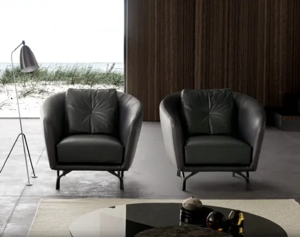Leather armchair with enveloping backrest Ethos by Valentini.
