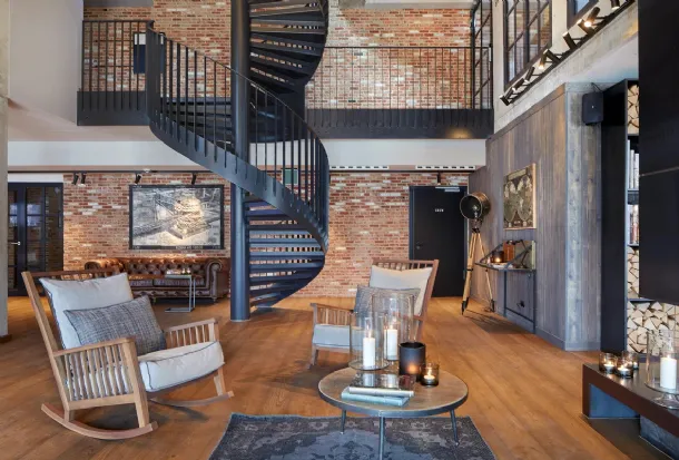 Gervasoni's Gray rocking armchair