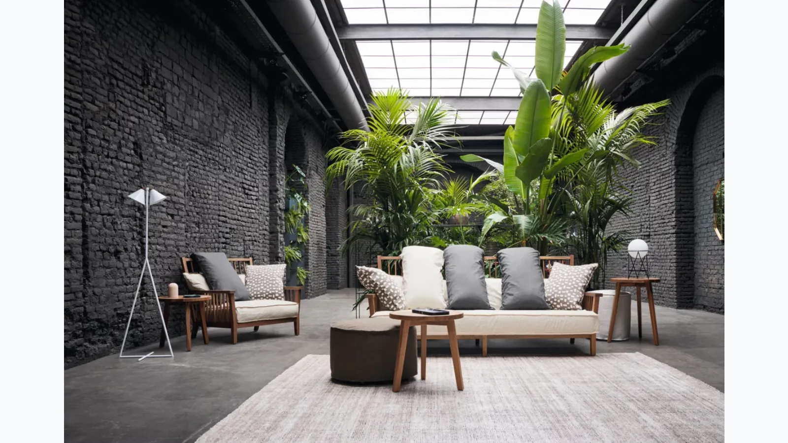 Gray armchair in walnut by Gervasoni