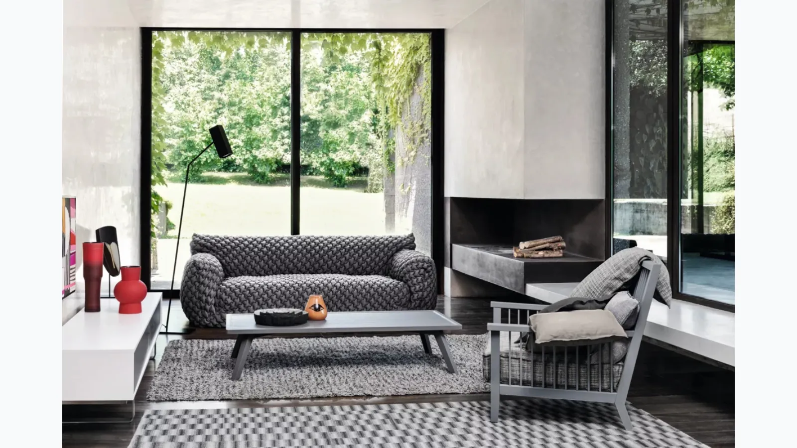 Wooden armchair with Gray upholstered seat by Gervasoni.