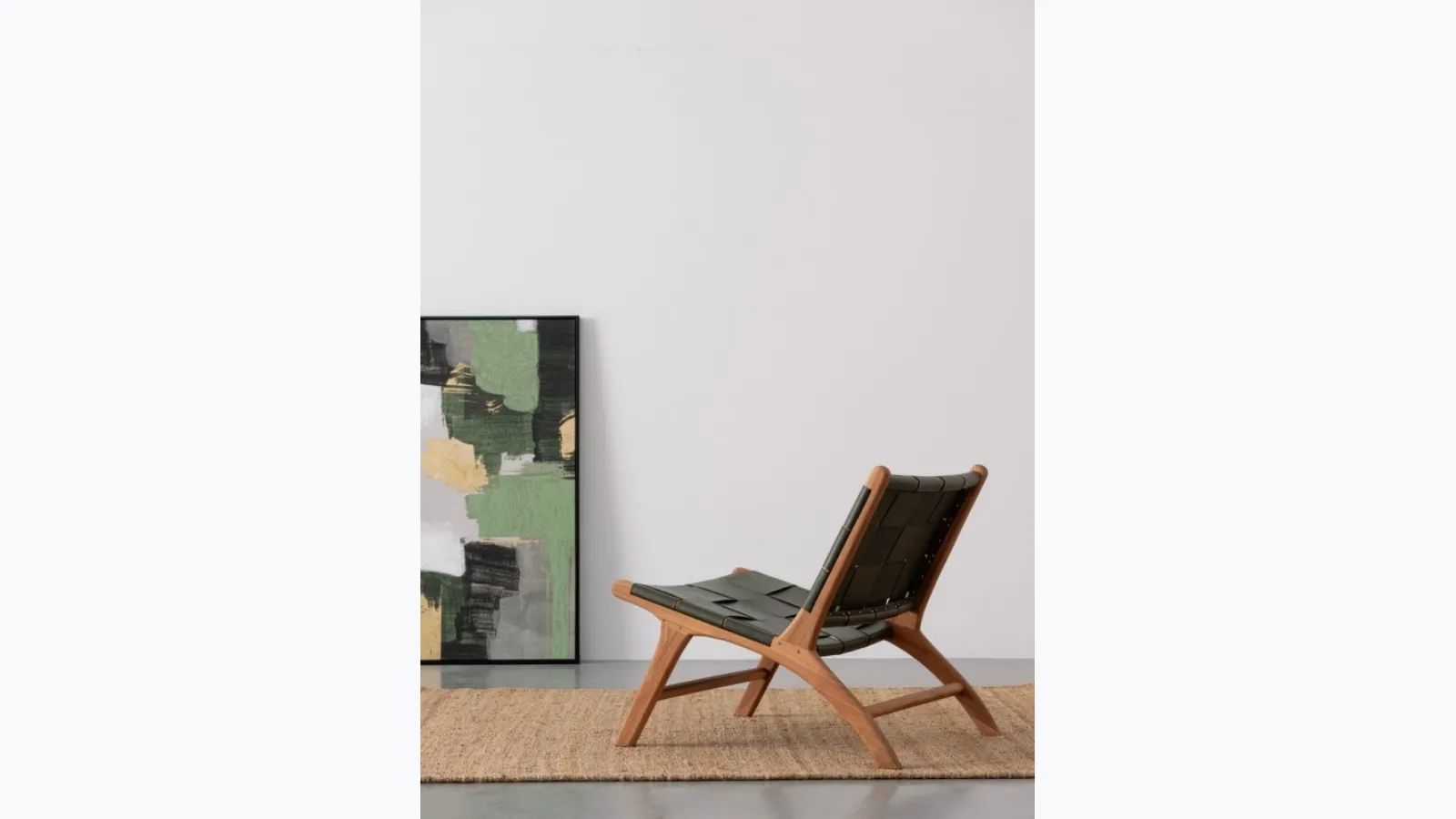 Joanna leather and teak Lounge armchair by Bizzotto.