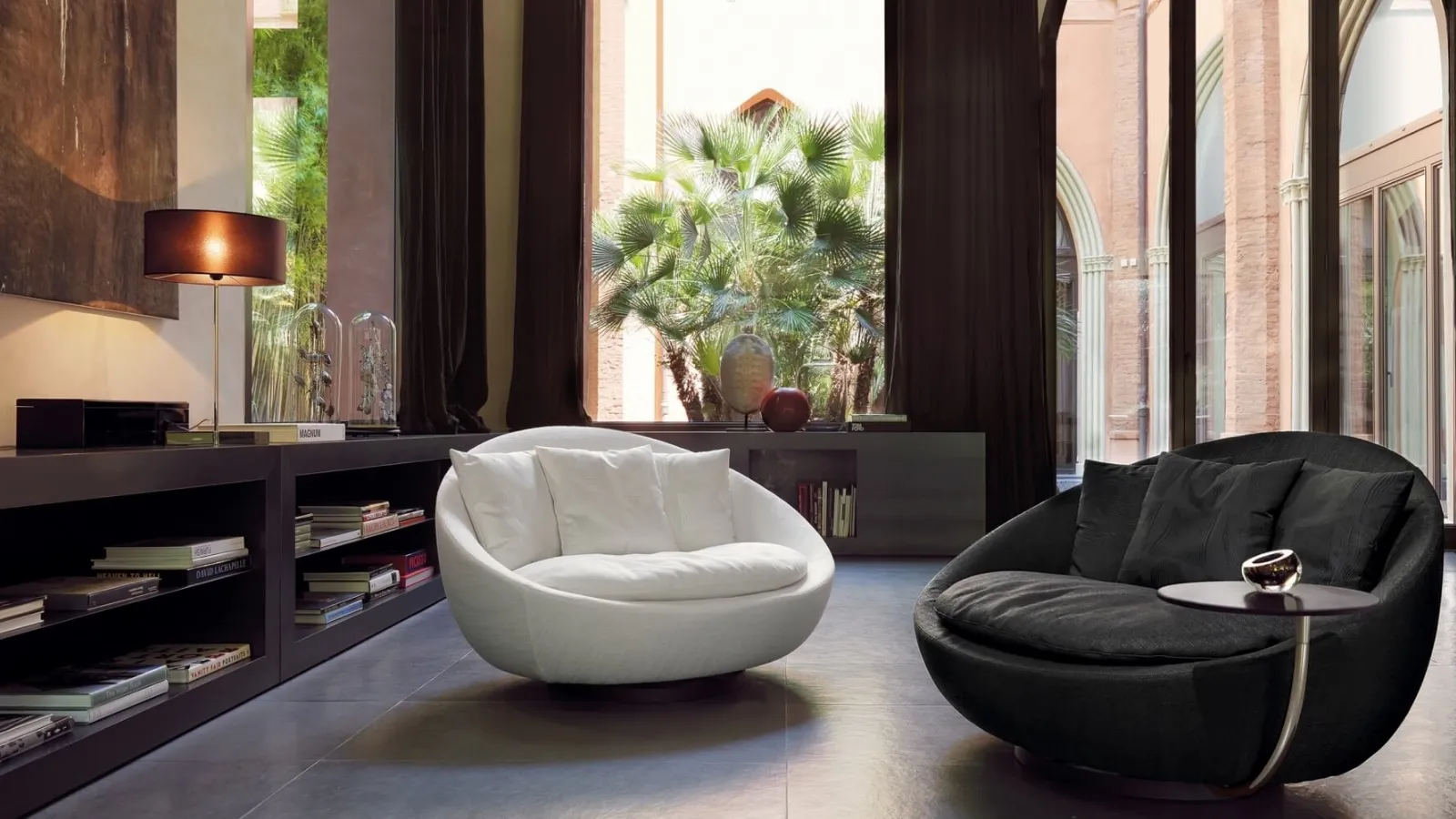 Maxi Lacoon swivel armchair in padded fabric by Desirèe.