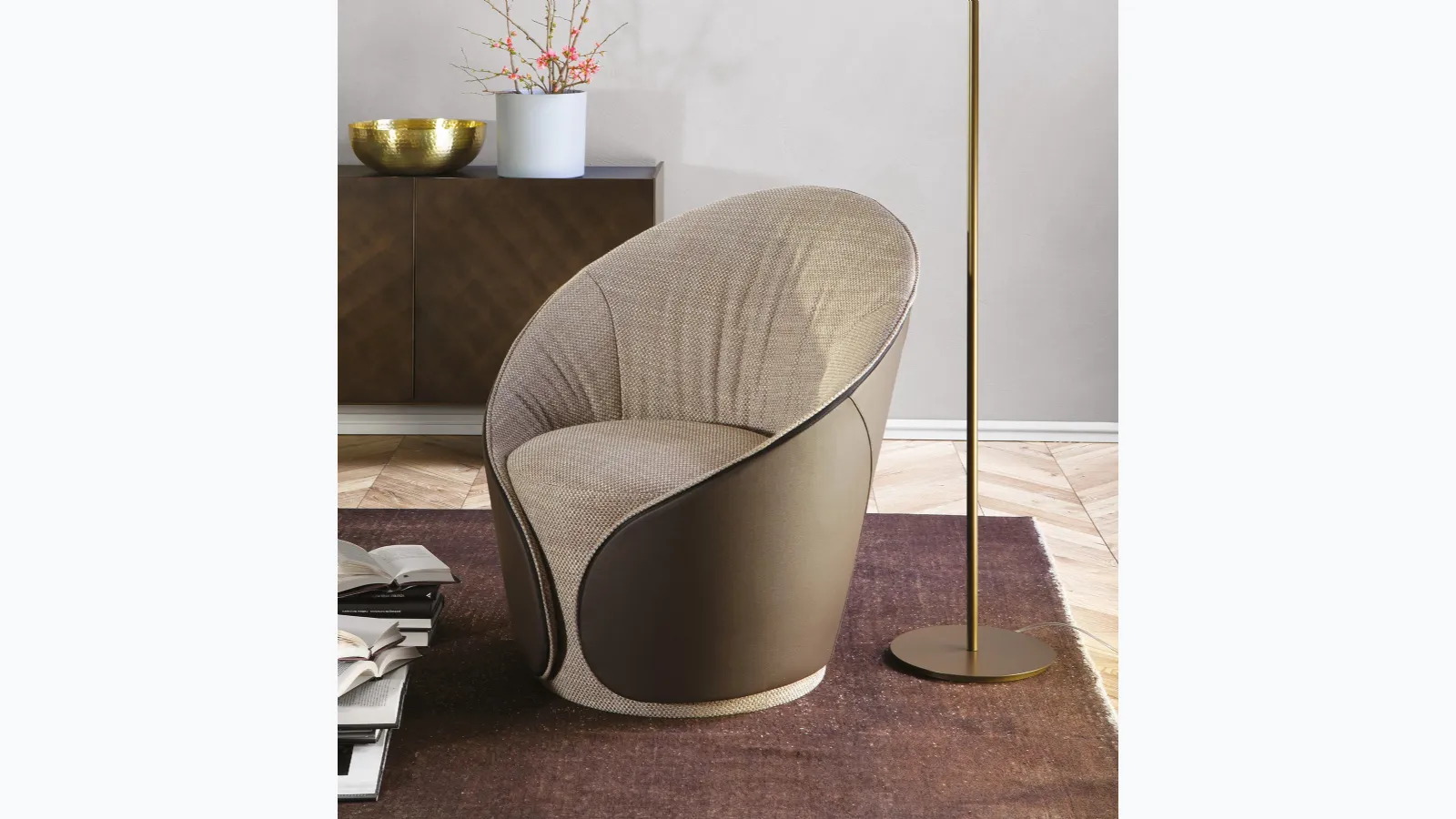 Mama armchair in fabric and leather by Tonin Casa.