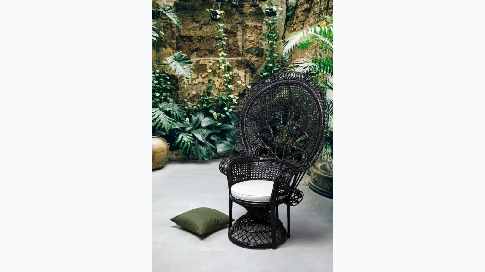 Peacock rattan armchair by Bizzotto.
