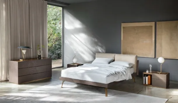Grafic Bed Hug with headboard and padded cushions by Sangiacomo.