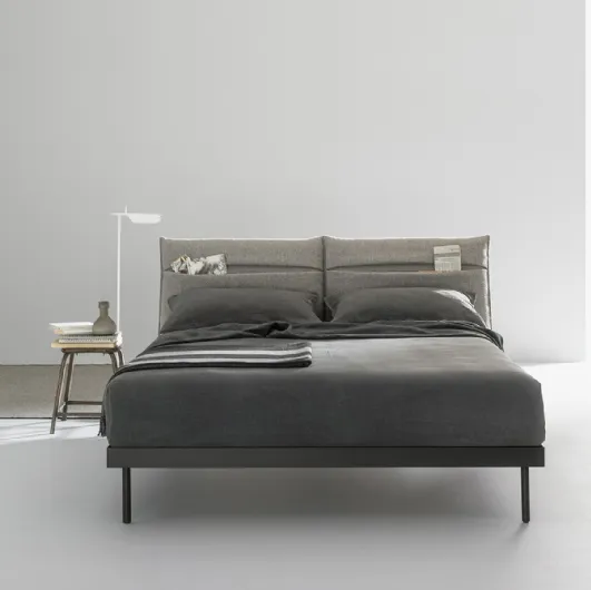 Double bed with fabric padded headboard with Ajar pocket by Caccaro.