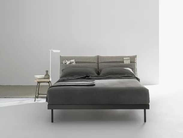 Double bed with fabric padded headboard with Ajar pocket by Caccaro.
