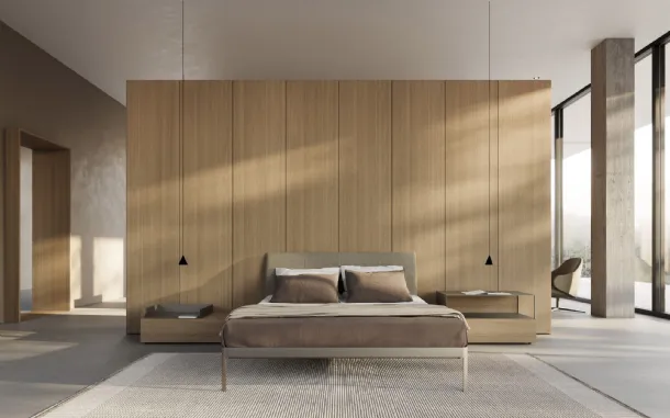 AluAlu Bed by Kristalia is an aluminium bed with a fabric headboard.