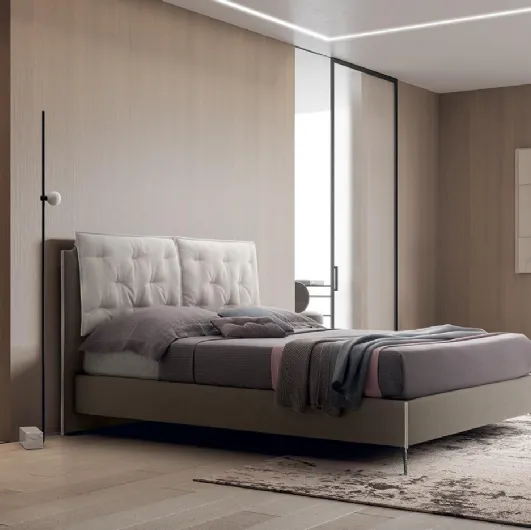 Double bed in Arley fabric by Felis.
