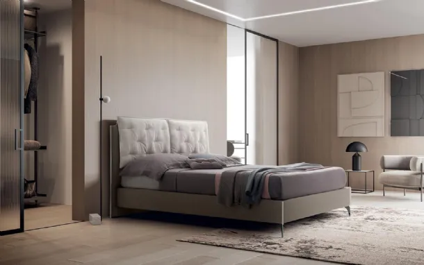 Double bed in Arley fabric by Felis.