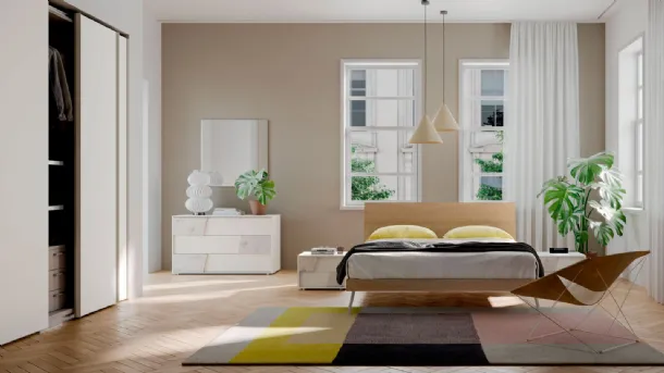 Double bed with a headboard bench in textured Oak by Orme.
