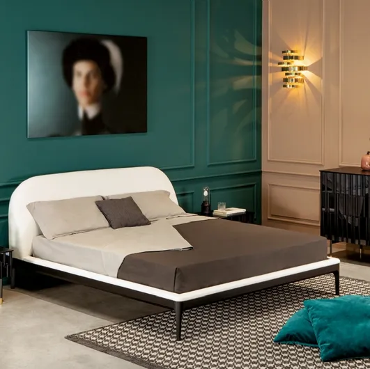 Padded bed with faux leather Bernini headboard by Tonin Casa.