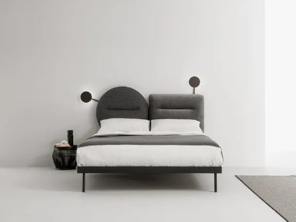 Bed with fabric headboard that can be split into two shapes to be combined with Bishape by Caccaro as desired.