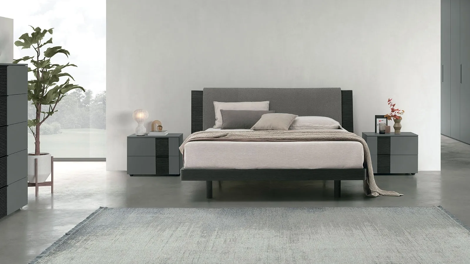 Double bed Bliss in textured oak with headboard softened by a padded panel by Tomasella.