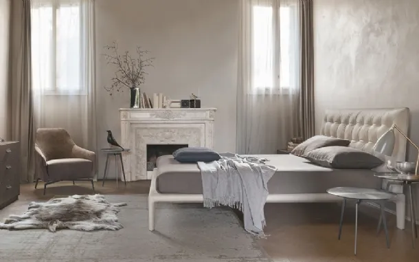 Leather bed with quilted and padded headboard Boheme by Alivar.