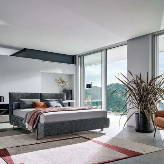 Fabric bed with Book headboard by Twils.