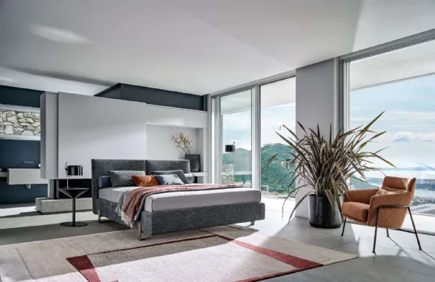 Fabric bed with Book headboard by Twils.