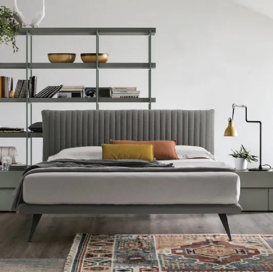 Tomasella's Bravo Plus upholstered and quilted fabric headboard bed.