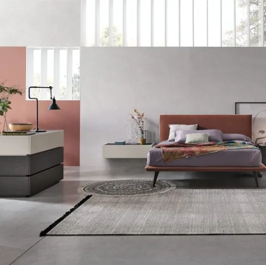Bravo bed with fabric headboard by Tomasella
