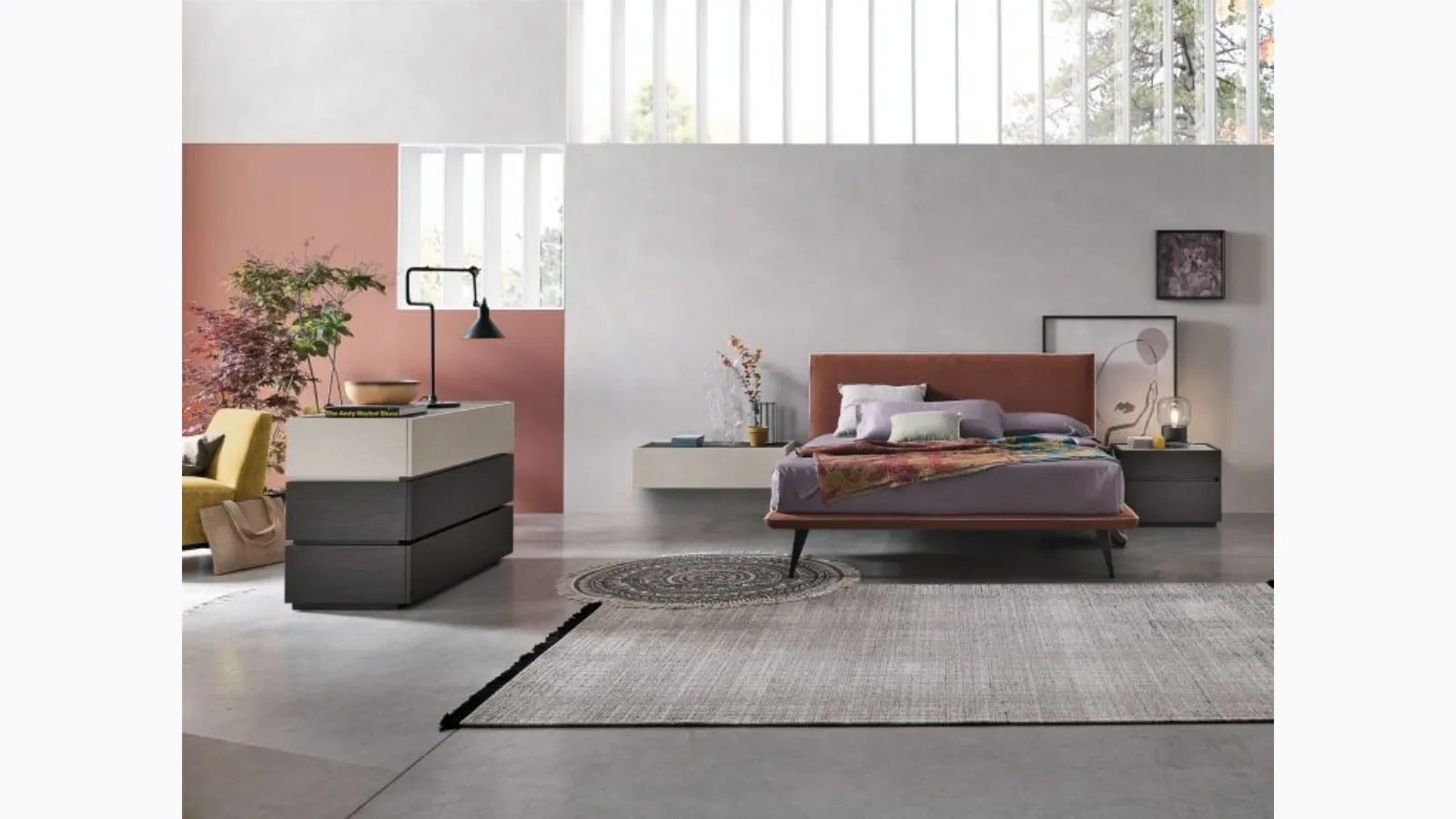 Bravo bed with fabric headboard by Tomasella