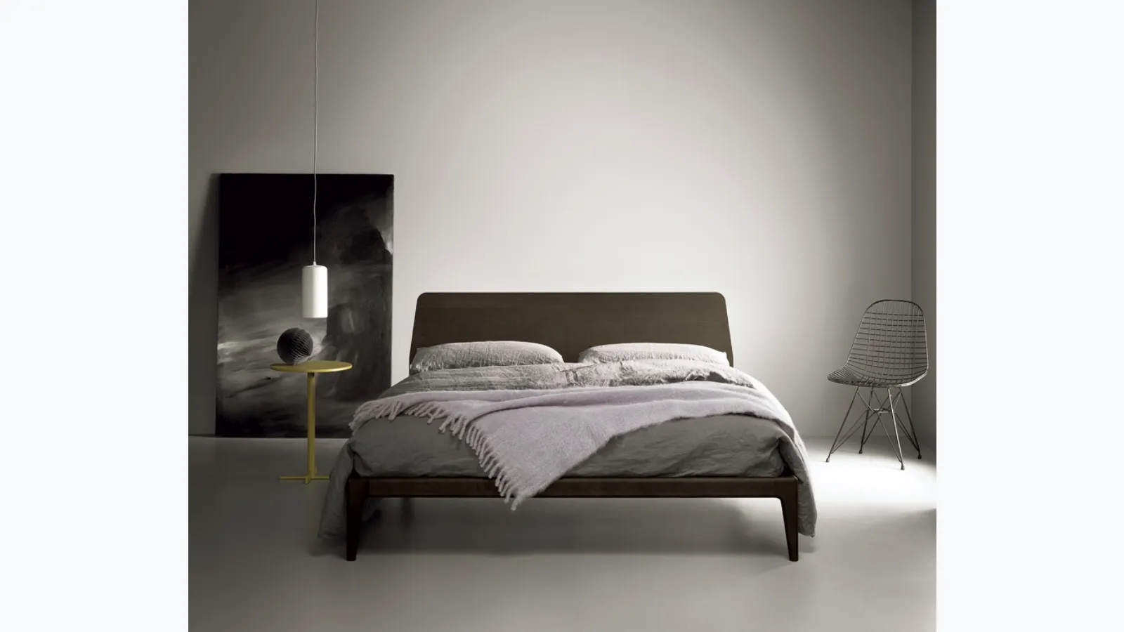 Wooden bed with Bun headboard by Kristalia