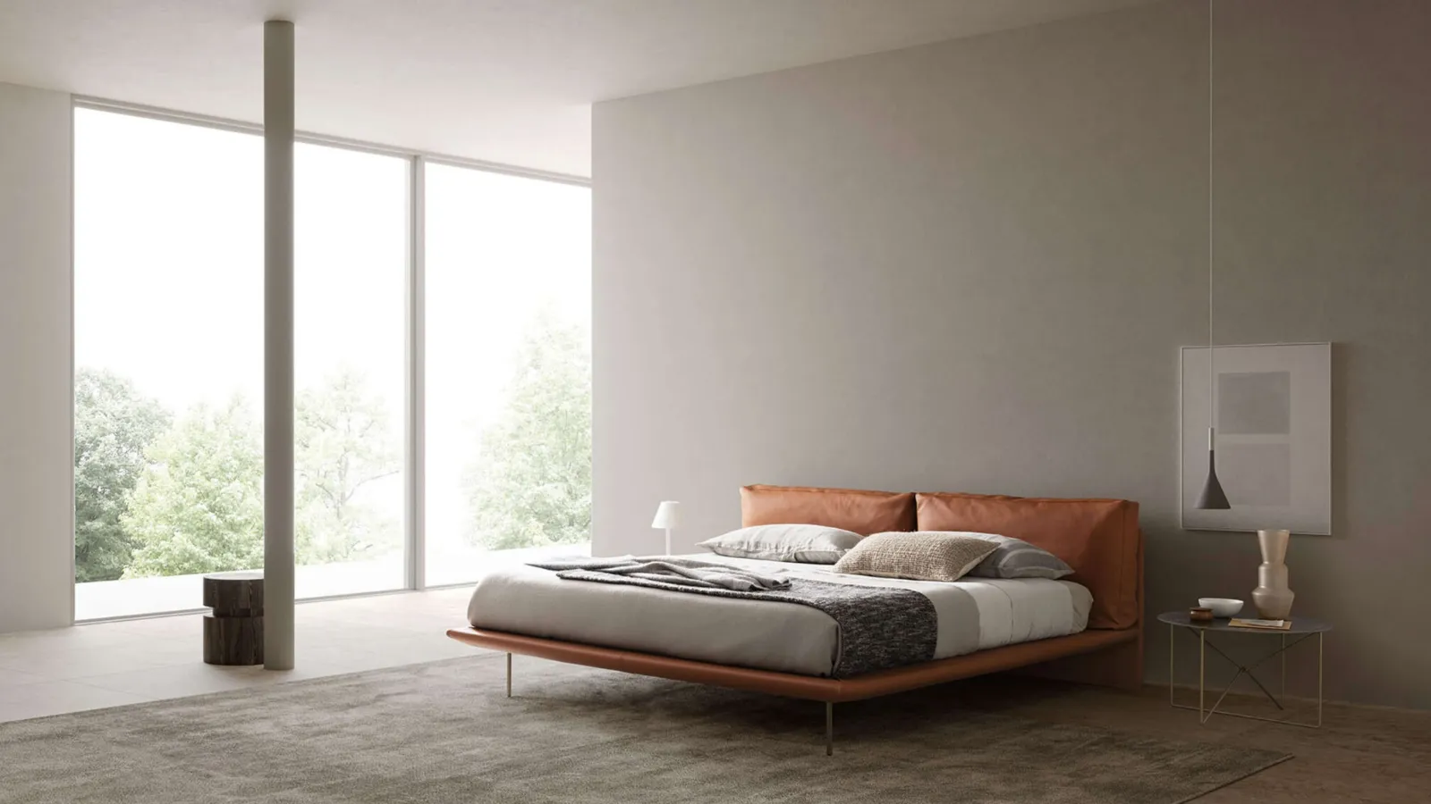Leather bed with headboard by Presotto.