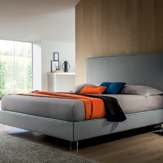 Simple and linear fabric bed with Charles headboard by Felis.