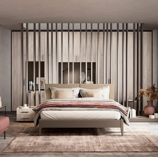 Bed with Cushy headboard by Colombini Casa