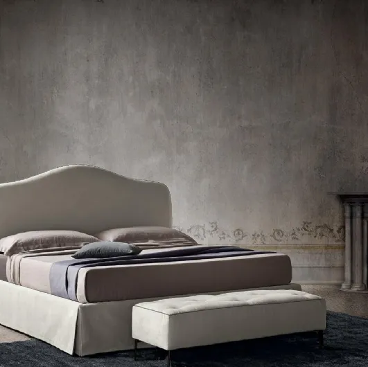 Fabric bed with shaped headboard Damian by Felis.