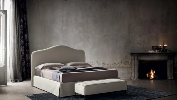Fabric bed with shaped headboard Damian by Felis.