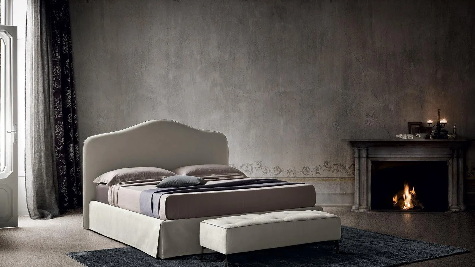 Fabric bed with shaped headboard Damian by Felis.