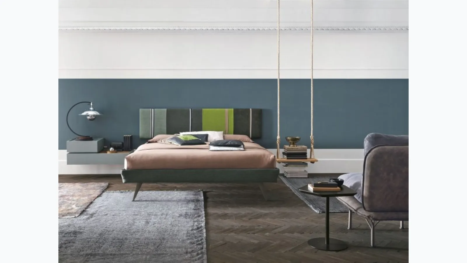 Diagonal sommier bed with headboard panel by Tomasella.