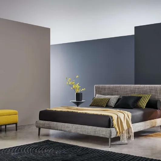 Fabric bed with Dread headboard by Twils.