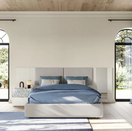 Eclectic EN04 bed in upholstered fabric and glass by Colombini Casa.