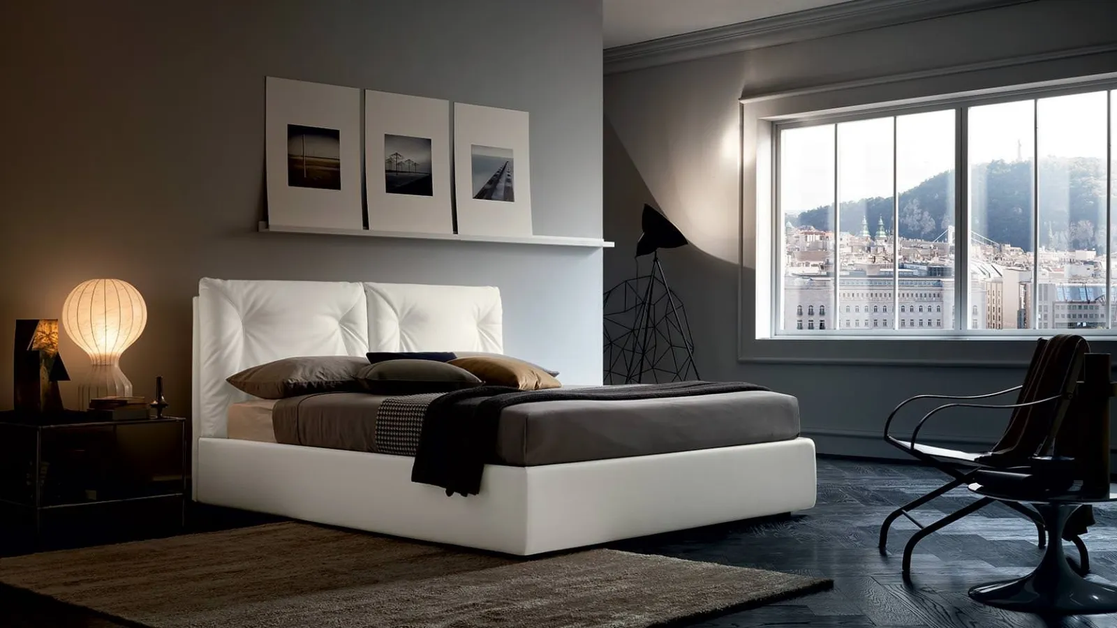 Leather bed with Edgar headboard by Felis.