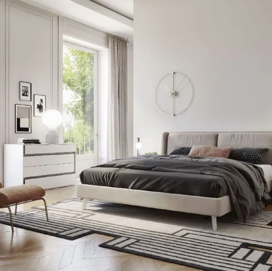 Padded fabric bed with Flap S75 headboard.