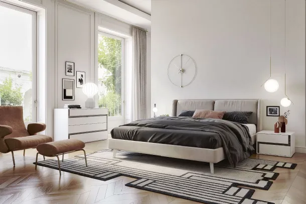 Padded fabric bed with Flap S75 headboard.