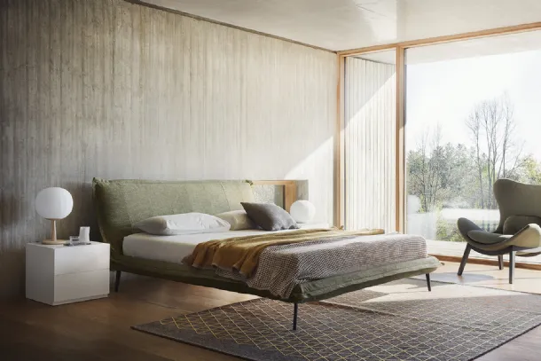 Upholstered Fluff fabric bed by Calligaris.