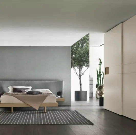 Fusion bed with fabric headboard by Tomasella