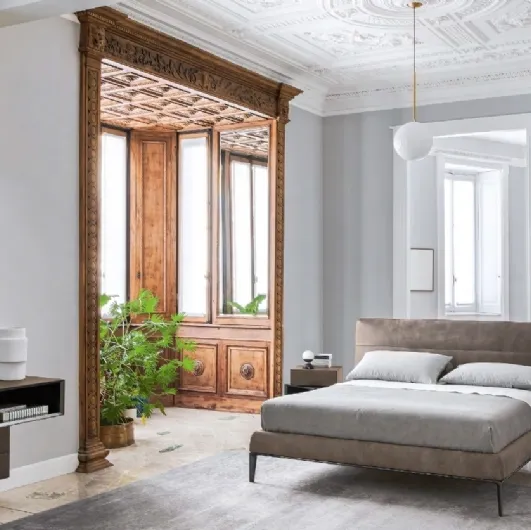 Vintage leather bed with Gaston headboard by Sangiacomo.